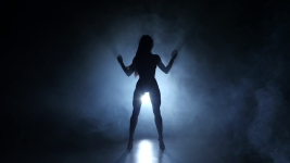 stock-video-silhouette-bodybuilding-girl-posing-on.png